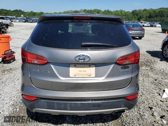 2015 Hyundai Santa Fe with VIN 5XYZT3LB4FG296155, listed as a Copart auction lot 57675435 with 70,209 mi miles and Salvage title. Bid and sale history available at DreamBid. Image 6.