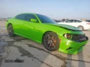 ✅ 2017 Dodge Charger Daytona 340 • VIN: 2C3CDXCT1HH566003 • Lot: 62527645. Listed on Copart with 115,171 mi. Free auction sales archive from the USA and detailed vehicle history report at DreamBid. Image 4.