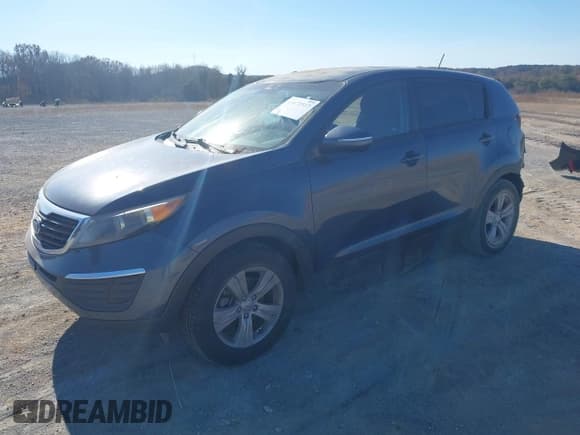 ✅ 2012 Kia Sportage LX • VIN: KNDPB3A2XC7250223 • Lot: 43672517. Listed on IAAI with 158,773 mi. Free auction sales archive from the USA and detailed vehicle history report at DreamBid. Image 2.