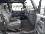 ✅ 2000 Jeep Wrangler Sport • VIN: 1J4FA49S8YP783696 • Lot: 43559467. Listed on IAAI with 132,396 mi. Free auction sales archive from the USA and detailed vehicle history report at DreamBid. Image 5.