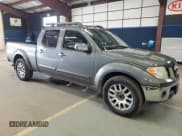 ✅ 2009 Nissan Frontier SE • VIN: 1N6AD09W49C413211 • Lot: 57777185. Listed on Copart with 210,839 mi. Free auction sales archive from the USA and detailed vehicle history report at DreamBid. Image 4.