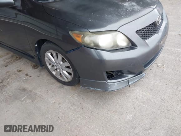 ✅ 2010 Toyota Corolla LE • VIN: 1NXBU4EE1AZ272877 • Lot: 43455603. Listed on IAAI with 222,561 mi. Free auction sales archive from the USA and detailed vehicle history report at DreamBid. Image 12.