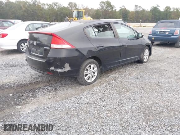 ✅ 2010 Honda Insight EX • VIN: JHMZE2H7XAS031038 • Лот: 43600971. Опубликован ранее на IAAI с пробегом Не указан. Бесплатный доступ к архиву аукционных продаж из США и подробный отчёт об истории автомобиля на DreamBid. Изображение 4.