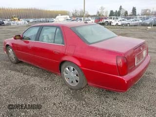 ✅ 2003 Cadillac DeVille DTS • VIN: 1G6KF57983U204070 • Lot: 43715931. Wystawiony na IAAI z przebiegiem 147 472 mil. Bezpłatny archiwum sprzedaży aukcyjnych z USA i szczegółowy raport historii pojazdu na DreamBid. Zdjęcie 3.