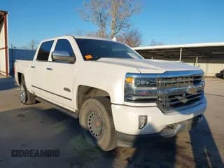 ✅ 2018 Chevrolet Silverado 1500 High Country • VIN: 3GCUKTEJ9JG131133 • Лот: 41389559. Опубликован ранее на IAAI с пробегом 221 788 миль. Бесплатный доступ к архиву аукционных продаж из США и подробный отчёт об истории автомобиля на DreamBid. Изображение 1.