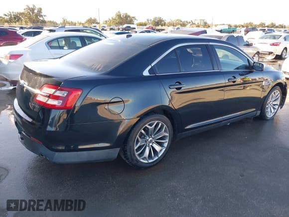 ✅ 2014 Ford Taurus Limited • VIN: 1FAHP2F83EG104915 • Lot: 41406872. Listed on IAAI with 167,658 mi. Free auction sales archive from the USA and detailed vehicle history report at DreamBid. Image 4.