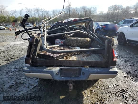 2004 Dodge Dakota SLT z VIN 1D7HL48K34S736938, wystawiony jako Copart lot #85283154 z przebiegiem Nie podano mil oraz Szkoda całkowita • Salvage title. Historia ofert i sprzedaży dostępna na DreamBid. Obrazek 6.