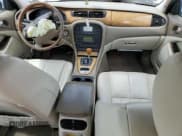 ✅ 2003 Jaguar S-Type • VIN: SAJEA01T13FM91421 • Лот: 62211735. Опубликован ранее на Copart с пробегом Не указан. Бесплатный доступ к архиву аукционных продаж из США и подробный отчёт об истории автомобиля на DreamBid. Изображение 8.
