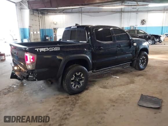✅ 2023 Toyota Tacoma SR • VIN: 3TMCZ5AN1PM583518 • Lot: 41842903. Listed on IAAI with 24,204 mi. Free auction sales archive from the USA and detailed vehicle history report at DreamBid. Image 4.