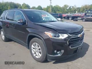 2019 Chevrolet Traverse LT Cloth z VIN 1GNEVGKW1KJ143612, wystawiony jako IAAI lot #43298389 z przebiegiem 104 681 mil mil oraz . Historia ofert i sprzedaży dostępna na DreamBid. Obrazek 1.