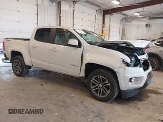 ✅ 2019 Chevrolet Colorado 4WD Work Truck • VIN: 1GCGTBEN2K1340818 • Лот: 42893809. Опубликован ранее на IAAI с пробегом 76 535 миль. Бесплатный доступ к архиву аукционных продаж из США и подробный отчёт об истории автомобиля на DreamBid. Изображение 1.