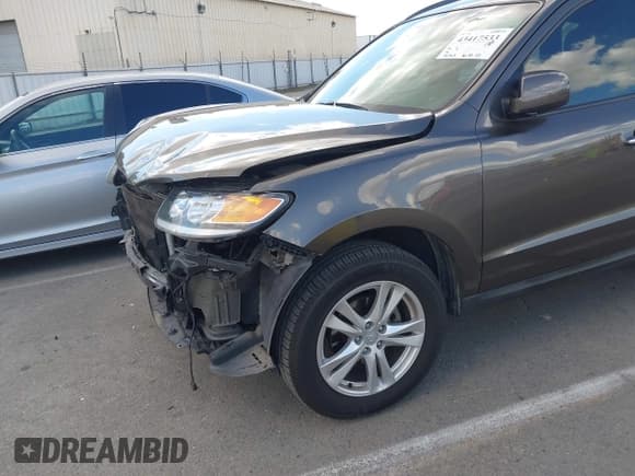 ✅ 2012 Hyundai Santa Fe Limited • VIN: 5XYZKDAG3CG136593 • Лот: 43417533. Опубликован ранее на IAAI с пробегом 71 725 миль. Бесплатный доступ к архиву аукционных продаж из США и подробный отчёт об истории автомобиля на DreamBid. Изображение 15.