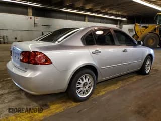 ✅ 2007 Kia Optima LX • VIN: KNAGE123475109066 • Лот: 41294354. Опубликован ранее на Copart с пробегом 134 888 миль. Бесплатный доступ к архиву аукционных продаж из США и подробный отчёт об истории автомобиля на DreamBid. Изображение 3.