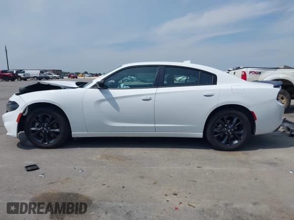 ✅ 2023 Dodge Charger SXT • VIN: 2C3CDXJG2PH706094 • Лот: 43162048. Опубликован ранее на IAAI с пробегом 61 307 миль. Бесплатный доступ к архиву аукционных продаж из США и подробный отчёт об истории автомобиля на DreamBid. Изображение 14.