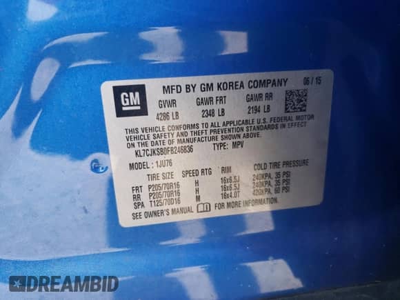 2015 Chevrolet Trax LS z VIN KL7CJKSB0FB246836, wystawiony jako Copart lot #82005255 z przebiegiem 105 912 mil mil oraz Szkoda całkowita • Salvage title. Historia ofert i sprzedaży dostępna na DreamBid. Obrazek 13.