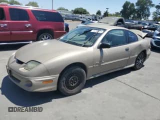 ✅ 2002 Pontiac Sunfire SE • VIN: 1G2JB124327241053 • Lot: 64280825. Wystawiony na Copart z przebiegiem 298 565 mil. Bezpłatny archiwum sprzedaży aukcyjnych z USA i szczegółowy raport historii pojazdu na DreamBid. Zdjęcie 1.