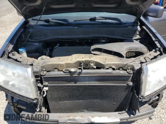 ✅ 2014 Honda Pilot EX-L • VIN: 5FNYF3H76EB028303 • Lot: 56030285. Listed on Copart with 187,414 mi. Free auction sales archive from the USA and detailed vehicle history report at DreamBid. Image 12.