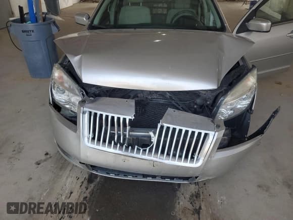 ✅ 2007 Mercury Milan • VIN: 3MEHM01187R620196 • Lot: 60523615. Listed on Copart with 104,678 mi. Free auction sales archive from the USA and detailed vehicle history report at DreamBid. Image 11.