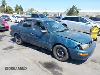 ✅ 1994 Geo Prizm • VIN: 1Y1SK5385RZ021108 • Lot: 43110823. Listed on IAAI with 386,785 mi. Free auction sales archive from the USA and detailed vehicle history report at DreamBid. Image 1.