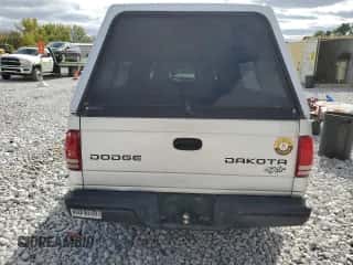 2004 Dodge Dakota z VIN 1D7GL12K24S653634, wystawiony jako Copart lot #74799854 z przebiegiem 183 971 mil mil oraz Szkoda całkowita • Salvage title. Historia ofert i sprzedaży dostępna na DreamBid. Obrazek 6.