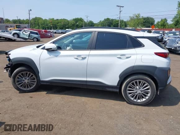 2021 Hyundai Kona SEL z VIN KM8K2CAA9MU615281, wystawiony jako IAAI lot #42403332 z przebiegiem 57 206 mil mil oraz . Historia ofert i sprzedaży dostępna na DreamBid. Obrazek 14.