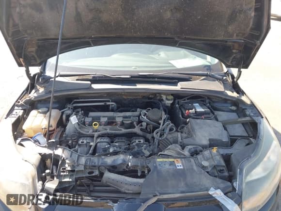 ✅ 2014 Ford Focus Titanium • VIN: 1FADP3J23EL237429 • Lot: 43358765. Listed on IAAI with 138,960 mi. Free auction sales archive from the USA and detailed vehicle history report at DreamBid. Image 10.