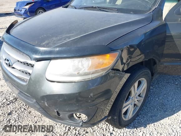 ✅ 2012 Hyundai Santa Fe Limited • VIN: 5XYZKDAG0CG096487 • Lot: 43597662. Wystawiony na IAAI z przebiegiem 206 592 mil. Bezpłatny archiwum sprzedaży aukcyjnych z USA i szczegółowy raport historii pojazdu na DreamBid. Zdjęcie 6.