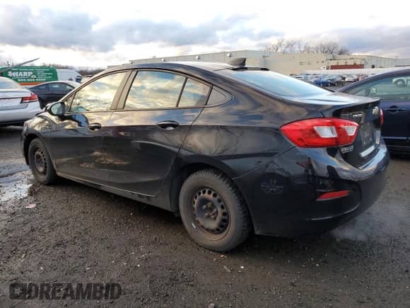 2016 Chevrolet Cruze LS z VIN 1G1BC5SM3G7260349, wystawiony jako Copart lot #67593332 z przebiegiem 98 922 mil mil oraz . Historia ofert i sprzedaży dostępna na DreamBid. Obrazek 2.