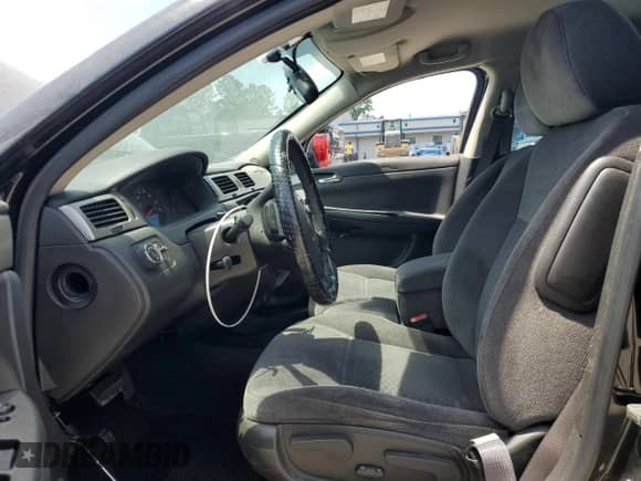 2014 Chevrolet Impala Police Police with VIN 2G1WD5E33E1107921, listed as a Copart auction lot 54584965 with Not provided miles and Salvage title. Bid and sale history available at DreamBid. Image 7.