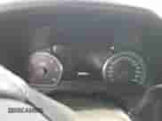 2020 Chevrolet Tahoe Premier with VIN 1GNSKCKC7LR125399, listed as a Copart auction lot 54702635 with 134,684 mi miles and Salvage title. Bid and sale history available at DreamBid. Image 9.