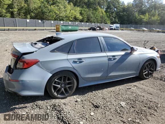 ✅ 2023 Honda Civic Sport • VIN: 2HGFE2F59PH506671 • Lot: 81258305. Listed on Copart with 38,169 mi. Free auction sales archive from the USA and detailed vehicle history report at DreamBid. Image 3.