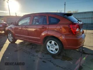 ✅ 2009 Dodge Caliber SXT • VIN: 1B3HB48A99D156885 • Лот: 89693905. Опубликован ранее на Copart с пробегом 173 469 миль. Бесплатный доступ к архиву аукционных продаж из США и подробный отчёт об истории автомобиля на DreamBid. Изображение 2.