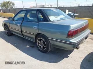 ✅ 1994 Subaru Legacy • VIN: 4S3BC6334R6641509 • Lot: 43197344. Listed on IAAI with 276,418 mi. Free auction sales archive from the USA and detailed vehicle history report at DreamBid. Image 3.