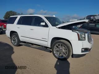 ✅ 2020 GMC Yukon Denali • VIN: 1GKS1CKJ9LR171525 • Lot: 43549196. Listed on IAAI with 70,822 mi. Free auction sales archive from the USA and detailed vehicle history report at DreamBid. Image 1.