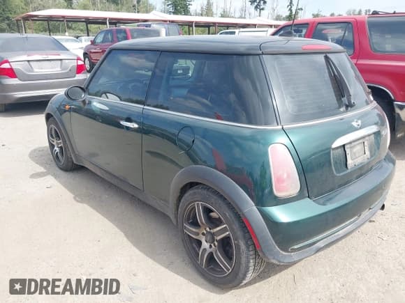 ✅ 2005 MINI Hardtop • VIN: WMWRC334X5TC59101 • Лот: 42467671. Опубликован ранее на IAAI с пробегом 180 264 миль. Бесплатный доступ к архиву аукционных продаж из США и подробный отчёт об истории автомобиля на DreamBid. Изображение 3.