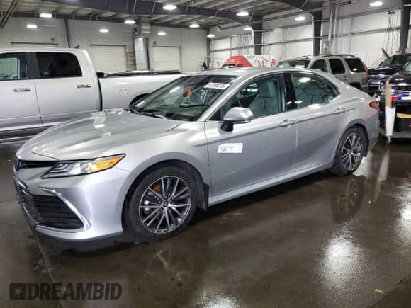 2023 Toyota Camry Hybrid XLE with VIN 4T1F31AK8PU608032, listed as a Copart auction lot 67080275 with 48,543 mi miles and Salvage title. Bid and sale history available at DreamBid. Image 1.