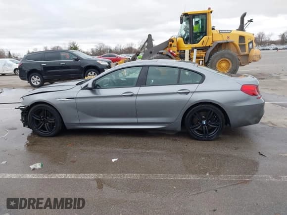 ✅ 2015 BMW 6 Series 650i • VIN: WBA6B2C59FGB99010 • Lot: 41845062. Listed on IAAI with 94,189 mi. Free auction sales archive from the USA and detailed vehicle history report at DreamBid. Image 14.