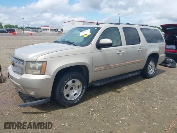 ✅ 2007 Chevrolet Suburban LTZ • VIN: 1GNFC16047R389477 • Lot: 42236857. Listed on IAAI with 212,863 mi. Free auction sales archive from the USA and detailed vehicle history report at DreamBid. Image 2.