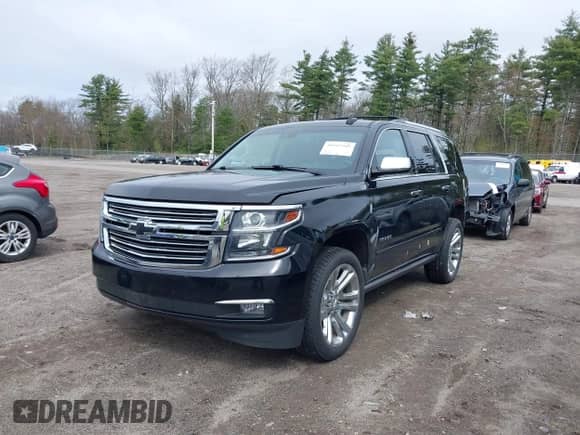 2020 Chevrolet Tahoe Premier z VIN 1GNSKCKJ4LR126699, wystawiony jako IAAI lot #39217949 z przebiegiem 83 245 mil mil oraz . Historia ofert i sprzedaży dostępna na DreamBid. Obrazek 2.