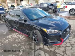 2022 Hyundai Veloster z VIN KMHT36AH1NU014206, wystawiony jako IAAI lot #41202982 z przebiegiem 26 572 mil mil oraz . Historia ofert i sprzedaży dostępna na DreamBid. Obrazek 1.