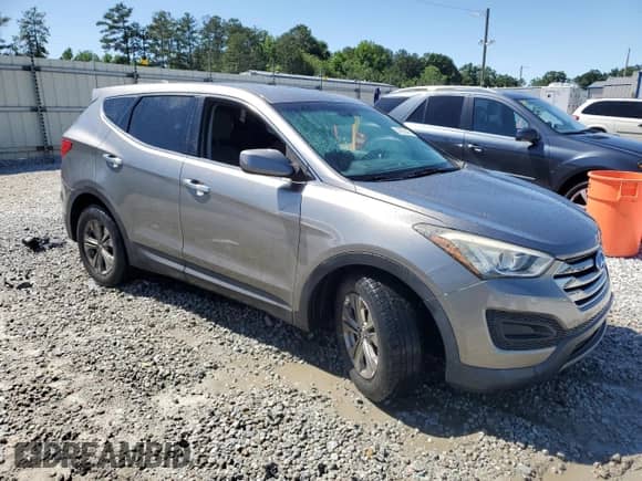 2015 Hyundai Santa Fe with VIN 5XYZT3LB4FG296155, listed as a Copart auction lot 57675435 with 70,209 mi miles and Salvage title. Bid and sale history available at DreamBid. Image 4.