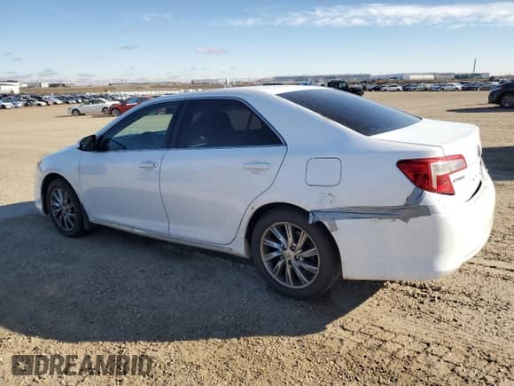2013 Toyota Camry L с VIN 4T1BF1FK2DU218019, выставлен на аукционе Copart как лот 87274575 с пробегом 205 574 миль миль и Списание • Salvage title. История ставок и продаж доступна на DreamBid. Изображение 2.