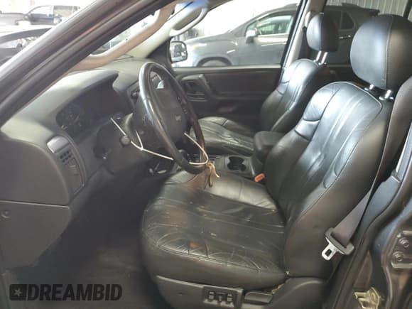 ✅ 2002 Jeep Grand Cherokee Laredo • VIN: 1J4GW48N92C321356 • Lot: 67315825. Listed on Copart with 112,829 mi. Free auction sales archive from the USA and detailed vehicle history report at DreamBid. Image 7.