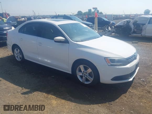✅ 2014 Volkswagen Jetta TDI w/Premium/Nav • VIN: 3VWLL7AJXEM366828 • Lot: 42392563. Listed on IAAI with 132,924 mi. Free auction sales archive from the USA and detailed vehicle history report at DreamBid. Image 1.