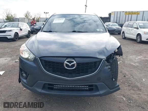 ✅ 2013 Mazda CX-5 Grand Touring • VIN: JM3KE4DE6D0100365 • Lot: 43710895. Wystawiony na IAAI z przebiegiem 215 619 mil. Bezpłatny archiwum sprzedaży aukcyjnych z USA i szczegółowy raport historii pojazdu na DreamBid. Zdjęcie 12.