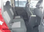 ✅ 2009 Jeep Patriot Sport • VIN: 1J4FT28A99D126240 • Lot: 43864631. Listed on IAAI with 124,559 mi. Free auction sales archive from the USA and detailed vehicle history report at DreamBid. Image 8.