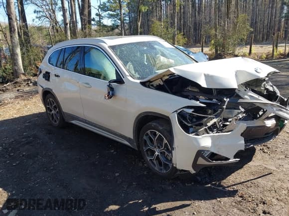 ✅ 2022 BMW X1 xDrive28i • VIN: WBXJG9C04N5V16794 • Lot: 41667535. Listed on IAAI with 55,747 mi. Free auction sales archive from the USA and detailed vehicle history report at DreamBid. Image 1.