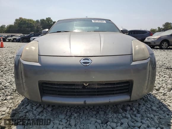 ✅ 2005 Nissan 350Z • VIN: JN1AZ34D85M608232 • Лот: 69145384. Опубликован ранее на Copart с пробегом 128 199 миль. Бесплатный доступ к архиву аукционных продаж из США и подробный отчёт об истории автомобиля на DreamBid. Изображение 5.