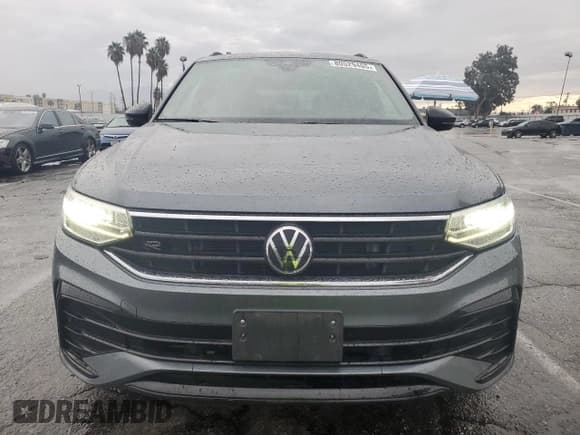 ✅ 2023 Volkswagen Tiguan SE R-Line Black • VIN: 3VVCB7AX8PM035521 • Лот: 80529405. Опубликован ранее на Copart с пробегом 90 123 миль. Бесплатный доступ к архиву аукционных продаж из США и подробный отчёт об истории автомобиля на DreamBid. Изображение 5.