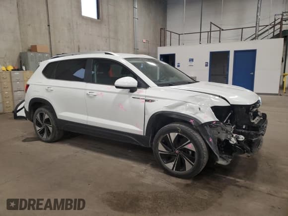 ✅ 2023 Volkswagen Taos SE • VIN: 3VVUX7B21PM370337 • Lot: 93189465. Wystawiony na Copart z przebiegiem 24 134 mil. Bezpłatny archiwum sprzedaży aukcyjnych z USA i szczegółowy raport historii pojazdu na DreamBid. Zdjęcie 4.